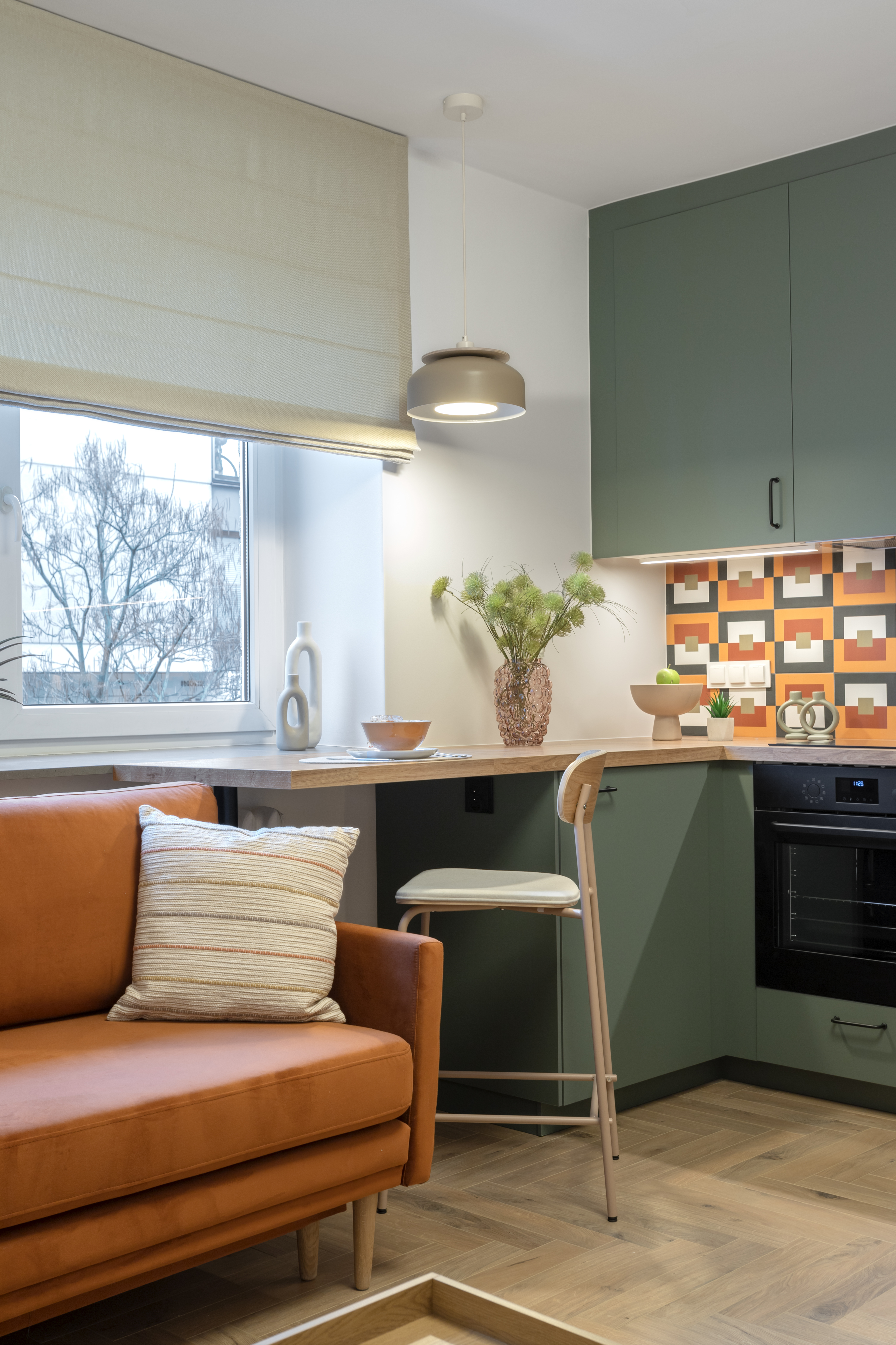 Black floor lamp on living room sofa