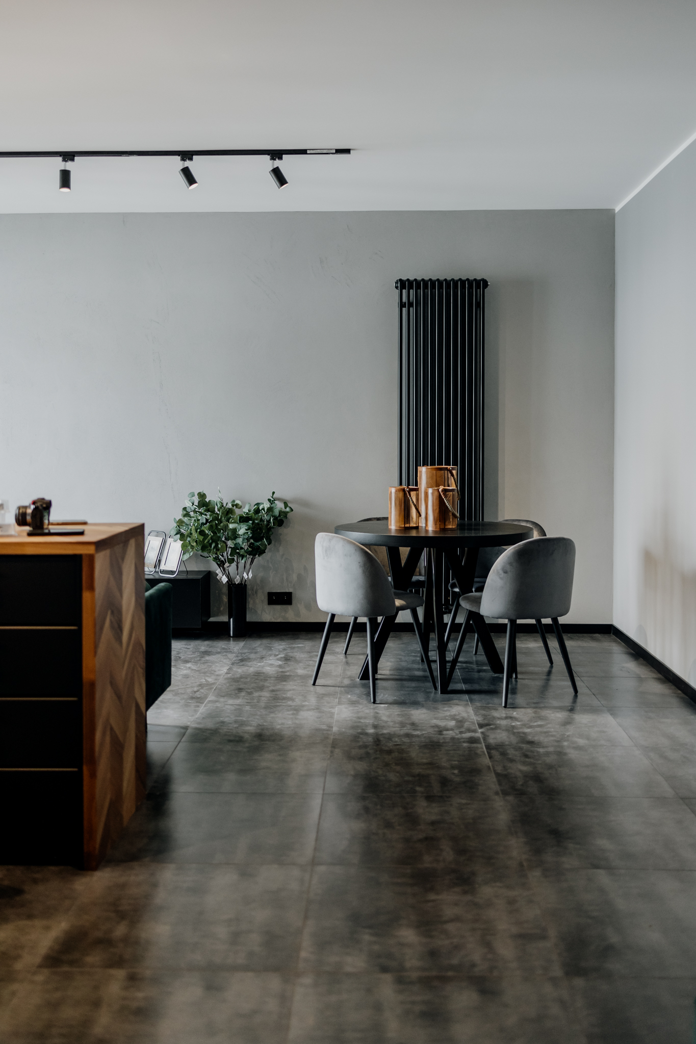 Black floor lamp on living room sofa