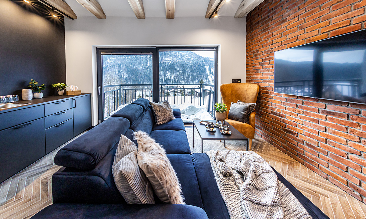 Black floor lamp on living room sofa