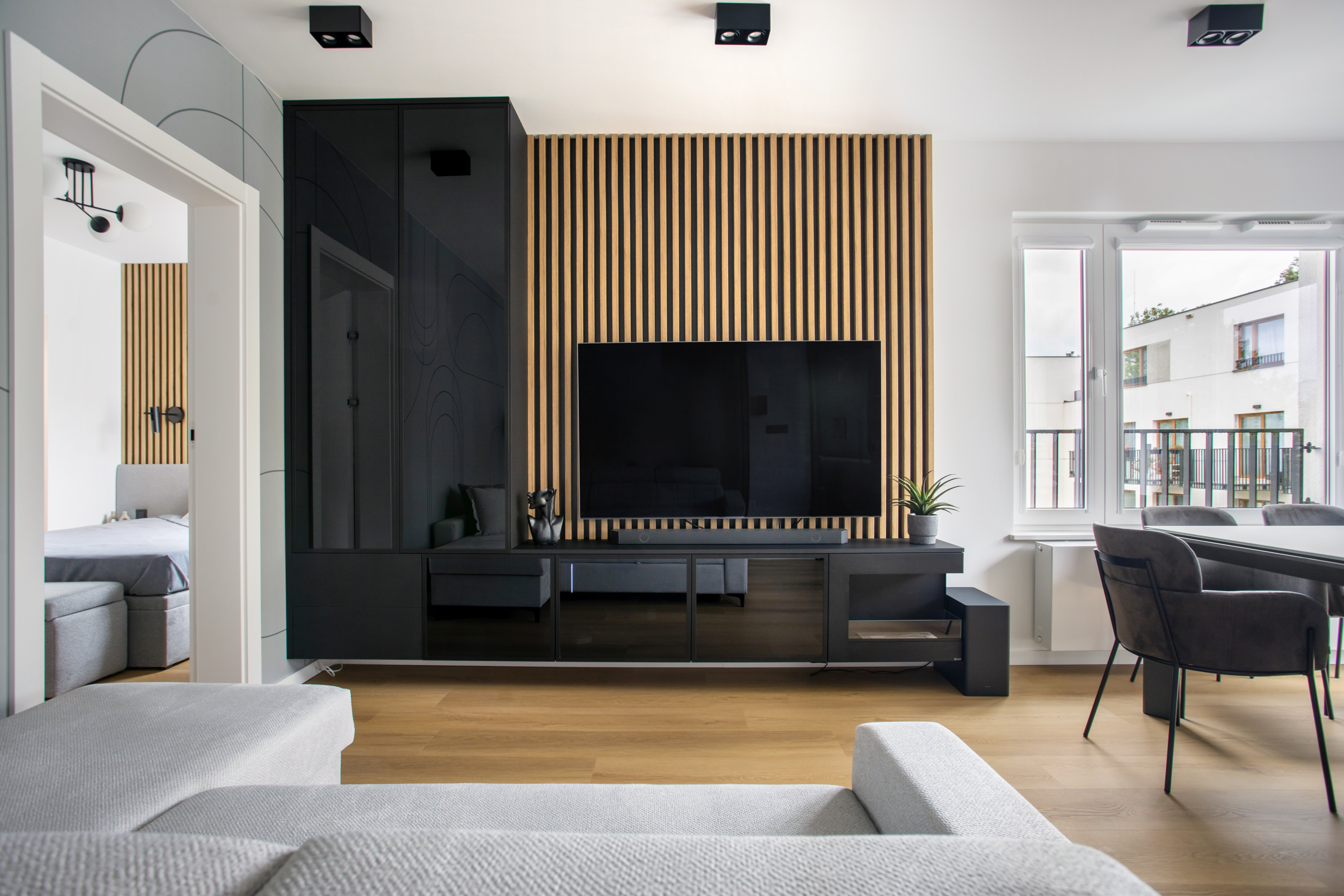 Black floor lamp on living room sofa